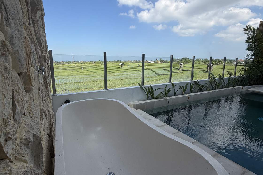 Outdoor stone soaking tub at Lumina Villa