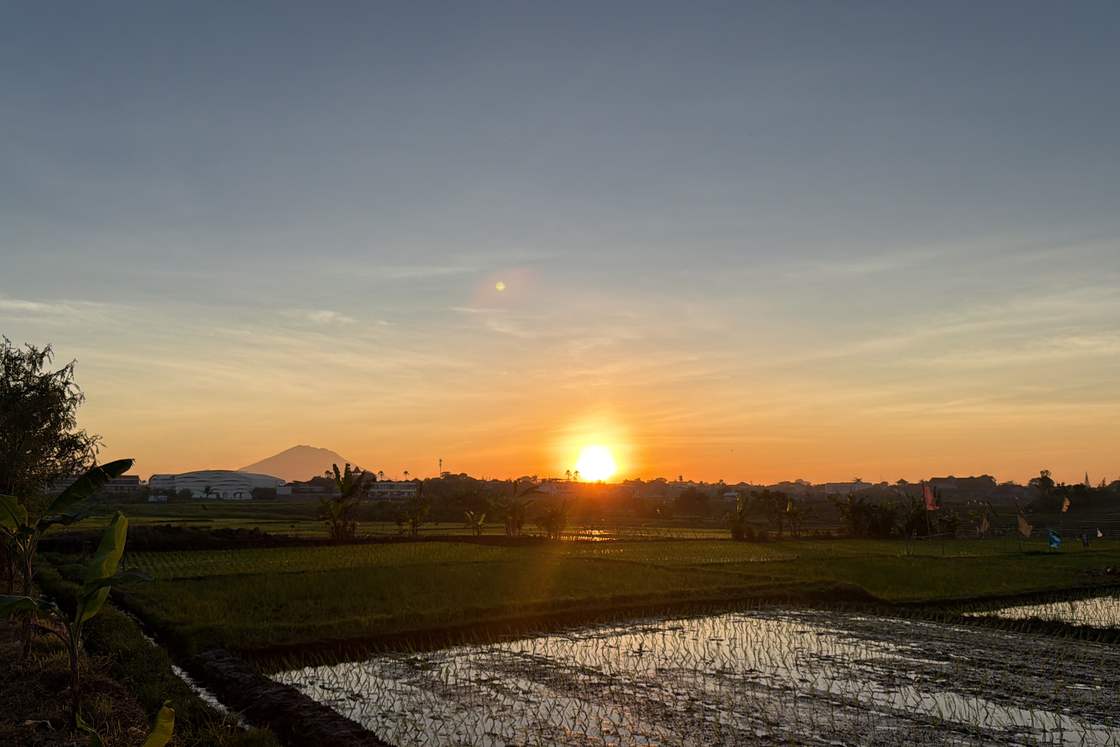 Sunset over Canggu rice fields from Lumina Villa