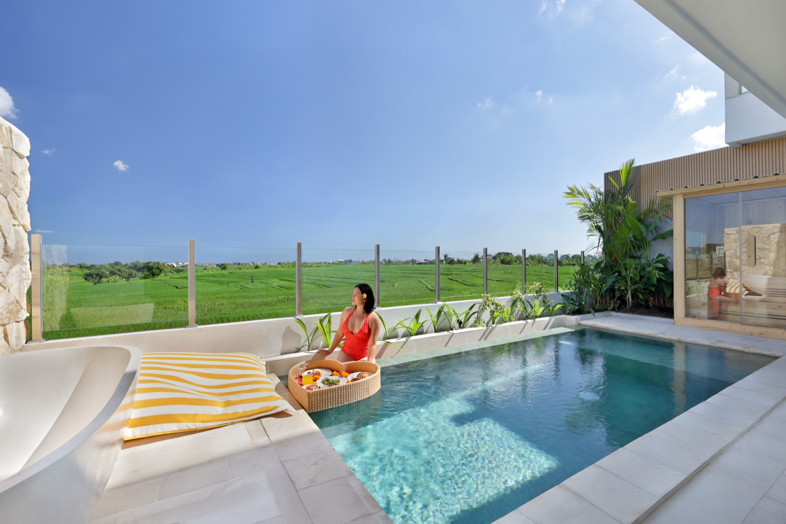 Pool terrace with rice field views